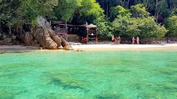 Travel Guide to Kapas Island: Backpacker's Paradise in Malaysia ,Overview of Kapas Island ,How to get to Kapas Island ,Marang Jetty to Kapas Island ,Staying in Marang for the night ,Kuala Terengganu to Pulau Kapas ,Singapore to Pulau Kapas ,Commute Tips ,Best time to visit Kapas Island ,Accommodation at Kapas Island ,Camping ,Budget Hotels ,Bungalows ,Luxury Resorts and Hotels in Kapas Island ,Turtle Valley Chalet ,The Light House ,Duta Puri Island Resort ,Kapas Island Resort ,Kapas Beach Chalet ,Makcik Gemok Beach Resort ,Qimy Chalet ,Kapas Garden Resort ,Harmony Camp Site ,Staying in Private Island - Gemia Island ,Bring enough cash ,Best Things to Do in Kapas Island ,Beach bum ,Captivating Sunsets in Kapas Island ,Turtle Spotting in Kapas Island ,Island Hoppoing in Kapas Island ,Snorkeling in Kapas Island ,The best place for Snorkeling ,Kayaking in Kapas Island ,Scuba diving in Kapas Island ,Explore the beaches by foot ,Hang Out On The Beach (and sunsets)! ,Play Volleyball ,Hike To The Other Side Of The Island ,Spot Kobe The Owl in Kapas Island ,Take photos of the rock formations ,Day trip to Gem Island ,Local Cuisine and Dining ,Cultural Experiences ,Wildlife, Marine Life, and Biodiversity in Kapas Island ,Neighboring Islands of Kapas Island to visit